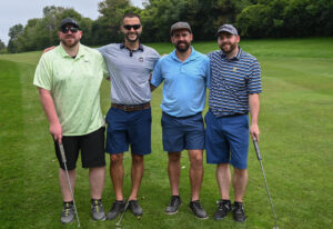 Pictured are Nick and Chris Shrimpton, Josh Swoleman, and Eric Hlywa golfing at Highland Park Golf Course in Auburn, New York.