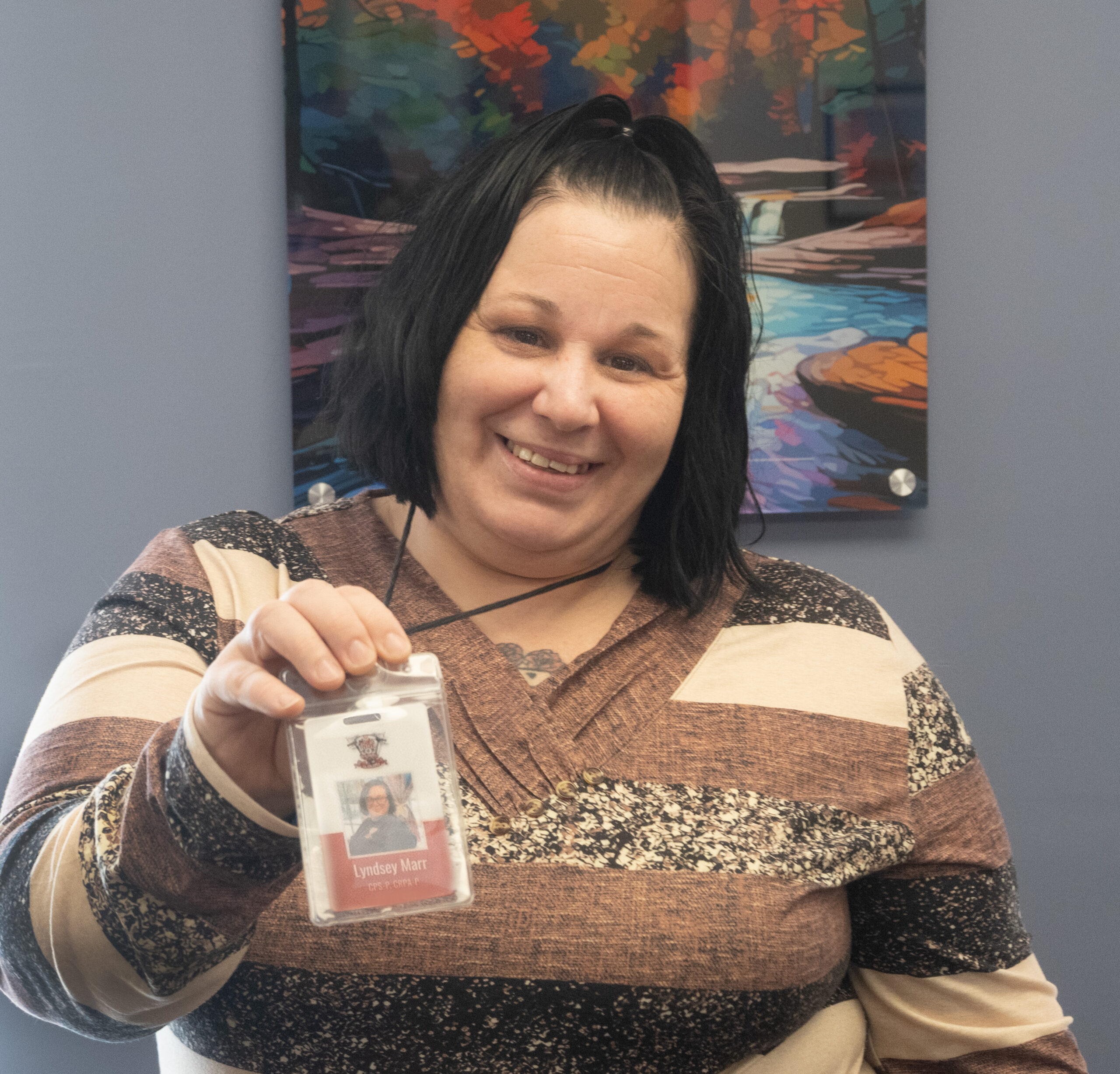 Lyndsey Marr holding nametag