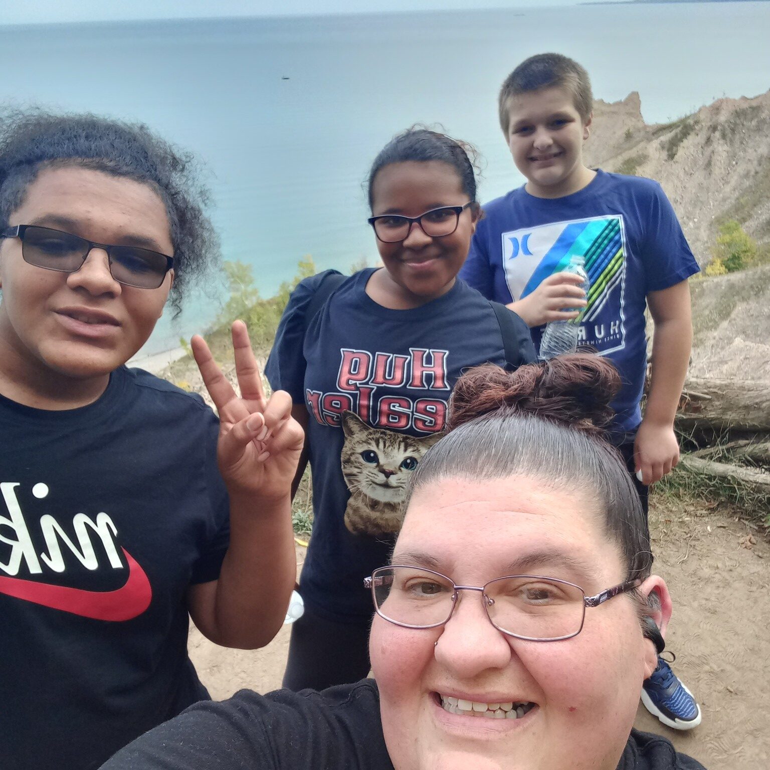 Amy Jefferson takes a selfie on a hike with her children at Chimney Bluffs State Park.